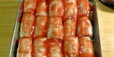 голубцы в духовке в томатном соусе