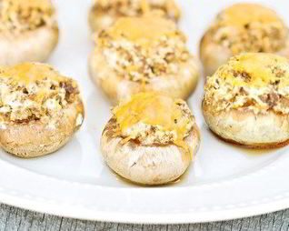 Грибные шляпки, фаршированные сырно-мясной начинкой