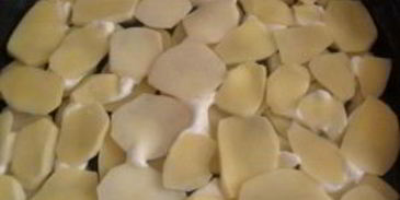 свинина по-французски с помидорами и картошкой