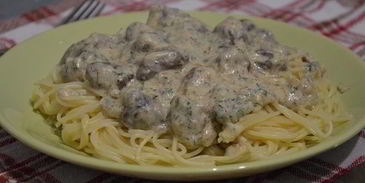 куриные сердечки в сырном соусе