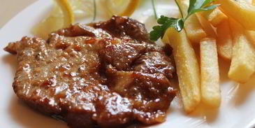 свиной стейк в апельсиновом маринаде