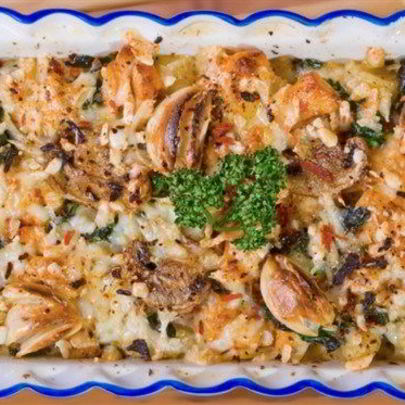 Запеченые ньокки с копченым окороком и цукини под сырным соусом