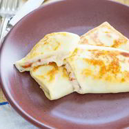 Рецепт Конвертиков из блинов с ветчиной