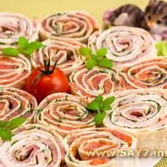 Рецепт Рулетиков из лаваша с семгой и ветчиной