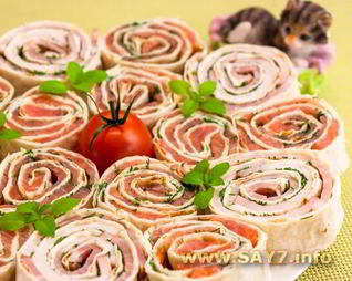 Рулетики из лаваша с семгой и ветчиной