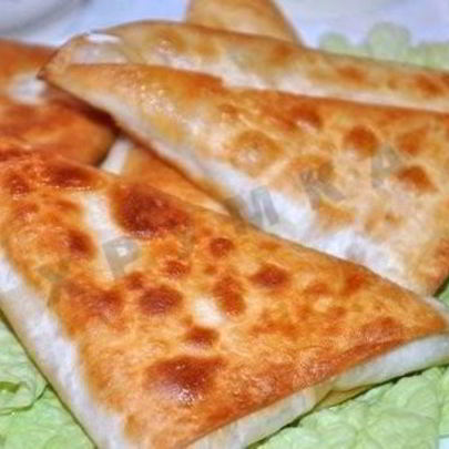Быстрые пирожки из лаваша с сыром и ветчиной