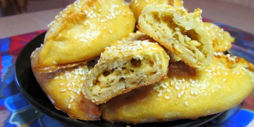 Рецепт пирожков с брынзоя и зеленью закусочных в духовке