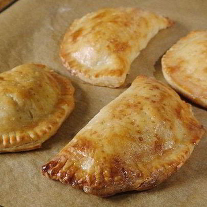 Пирожки с красной рыбой и рисом