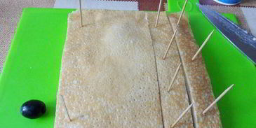 канапе с блинами и семгой